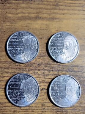 Set of 4 Commemorative Silver-Colored Coins